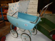 A 1950's Triang pressed steel dolls pram, COLLECT ONLY.