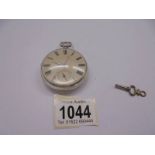 A silver pocket watch, D Bowen Alfreton, with key and in working order.