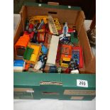 A large box of Dinky, Britain's, Lone Star etc., die cast vehicles.