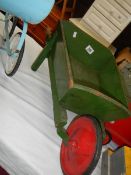 A vintage child's wooden wheel barrow, COLLECT ONLY.