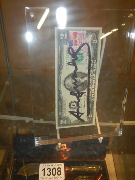 An Andy Warhol signed two dollar note with USA chemistry stamp in perspex frame with certificate - Image 2 of 3