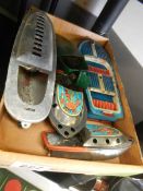 A selection of vintage tin plate steam putt putt boats