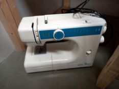 A Queen deluxe sewing machine