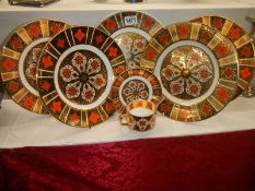 Five Burtondale Imari pattern plates and a cup and saucer.