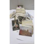 A mixed lot of old postcards.