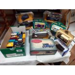 A quantity of boxed Corgi diecast vehicles and a quantity of other boxed cars plus some loose ones