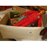 A box of vintage Action Man dolls, Six Million Dollar man and accessories.