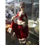 A Royal Doulton Pretty Ladies figure 'Winter'.