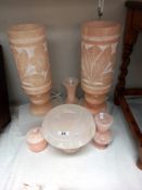 A good selection of pink alabaster including a pair of table lamps, comport, vases and trinket pot