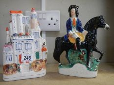Two Staffordshire flat back figure being Dick Turpin and a castle.