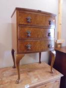 A three drawer chest on Queen Anne style legs, COLLECT ONLY.