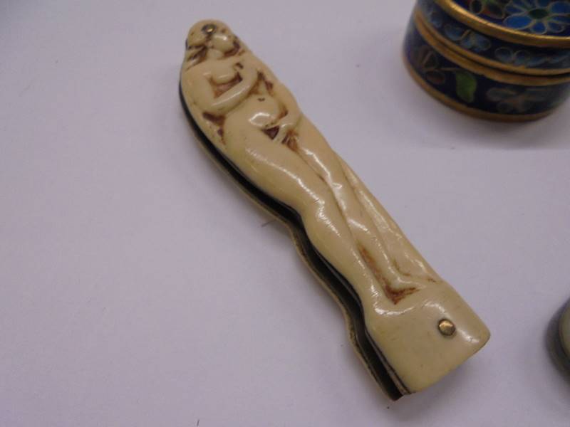 A silver penknife, a 1930's penknife with female nude and an enamel box. - Image 4 of 4