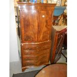 A mahogany two door cupboard on drawer base, COLLECT ONLY.