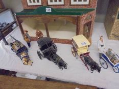 A doll house milkman, coal man, Rowntree's van and hansom cab. COLLECT ONLY.