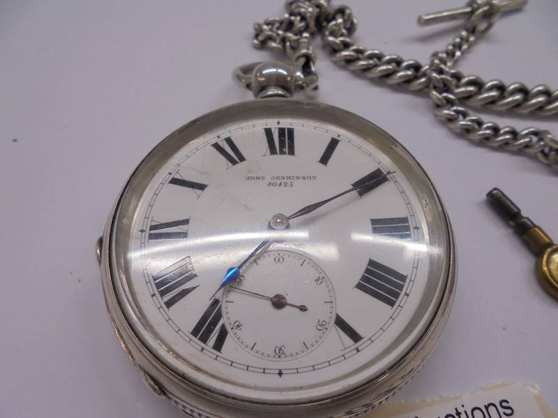 A silver pocket watch, John Jenkinson 40425 on silver Albert chain with key, in working order. - Image 2 of 4