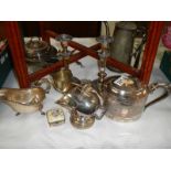 A good mixed lot of silver plate including candlesticks.