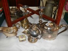 A good mixed lot of silver plate including candlesticks.