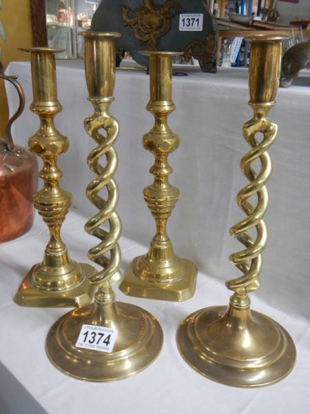 A pair of Victorian brass candlesticks and a pair of brass barley twist candlesticks. - Image 2 of 2