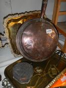 A mixed lot of brass and copper including warming pan, coal tongs, trays etc., COLLECT ONLY.
