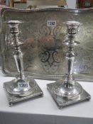 A good quality pair of silver plate candlesticks.