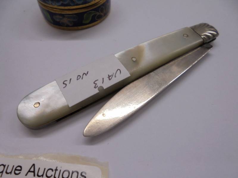 A silver penknife, a 1930's penknife with female nude and an enamel box. - Image 3 of 4