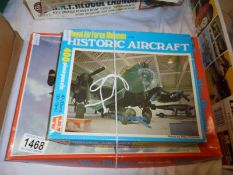 Two aircraft jigsaw puzzles (1 complete? in bag, 1 open).