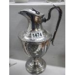 A Victorian silver plate chocolate pot.