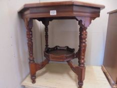 A Victorian mahogany octagonal table with under gallery, COLLECT ONLY.