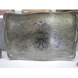 A large silver plate serving tray.