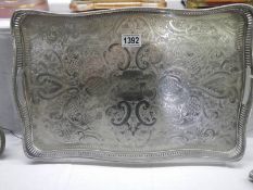 A large silver plate serving tray.