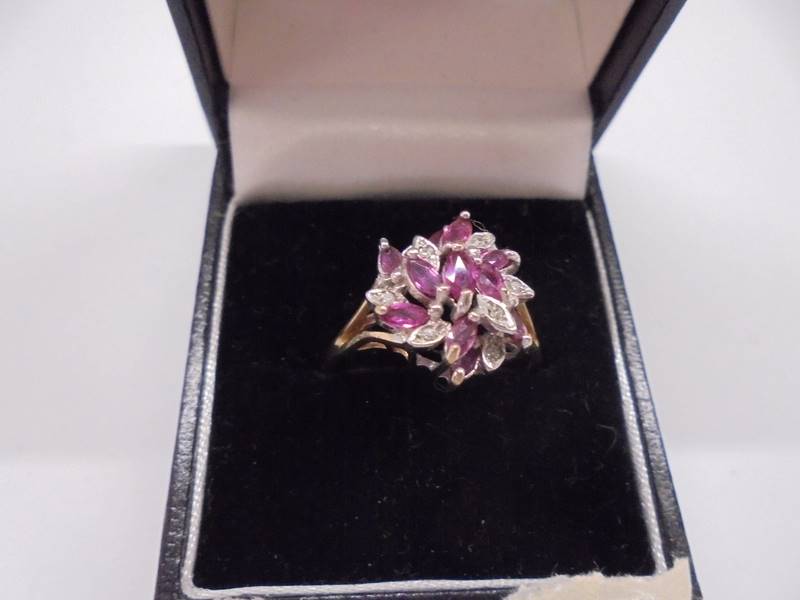 A diamond and amethyst yellow gold ring, size T, 3.1 grams. - Image 2 of 3