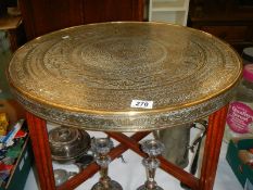 A folding Indian brass topped table, COLLECT ONLY.
