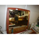 A 1970's teak framed retro mirror. COLLECT ONLY.