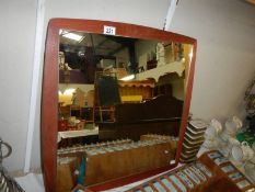 A 1970's teak framed retro mirror. COLLECT ONLY.
