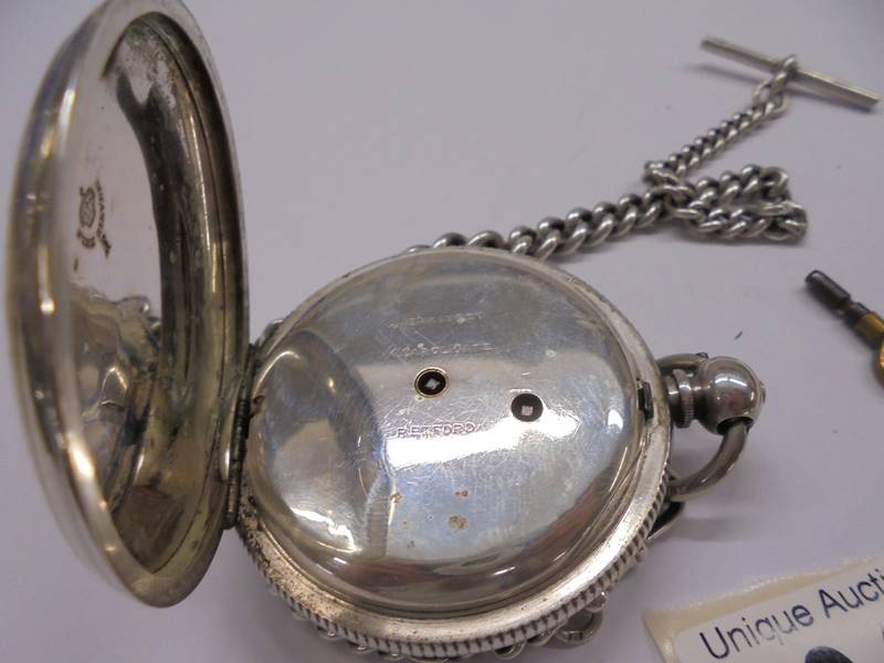 A silver pocket watch, John Jenkinson 40425 on silver Albert chain with key, in working order. - Image 4 of 4