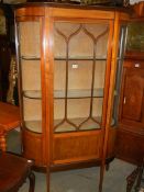 A superb quality Edwardian mahogany inlaid display cabinet with concave glass sides, COLLECT ONLY.