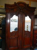 An early French carved armoire/wardrobe, COLLECT ONLY. (Breaks down for transport).