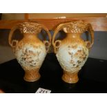 A pair of continental Vienna porcelain vases.