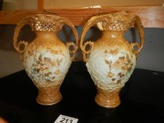 A pair of continental Vienna porcelain vases.