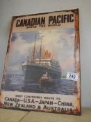 A retro style metal sign - Canadian Pacific ship with tug boat.