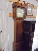A mahogany Grandfather clock in working order. COLLECT ONLY