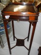 A Victorian mahogany lamp table. COLLECT ONLY.