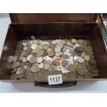 A small suitcase containing over 5 kg of world coins.