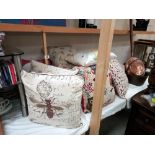 A good lot of cushions, including bees, owls, hares etc