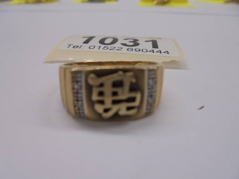 A 9ct gold ring with Chinese symbol, size Q, 3.7 grams. - Image 2 of 3