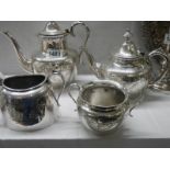 A four piece silver plate tea set.