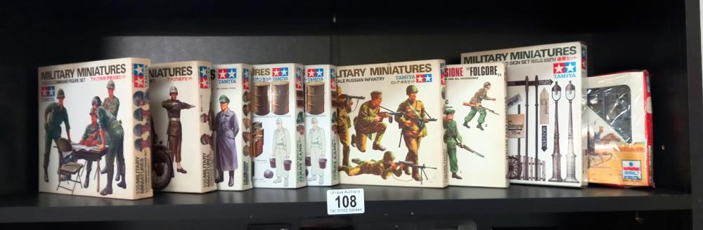 A quantity of boxed Tamiya 1/35 military miniatures soldiers and road sign sets unchecked
