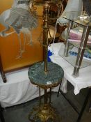 A brass and marble standard lamp. COLLECT ONLY.