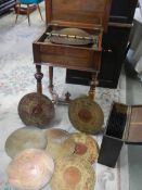 A Victorian syphonium in table base with multiple discs, COLLECT ONLY.