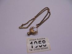 A 9ct gold chain with un-marked fob and yellow metal clasp, 42cm, total weight 6.9 grams.